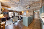 Experience the epitome of rustic luxury in this stunning property, featuring exquisite wooden accents throughout.