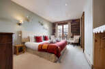 Experience the epitome of comfort and style in this exquisite bedroom.