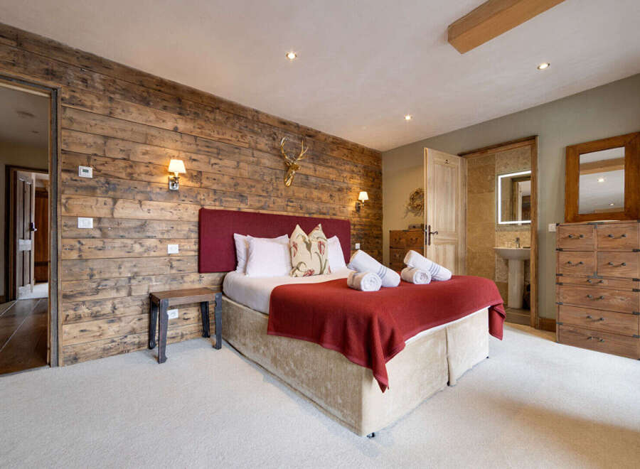 Experience rustic elegance in this stunning bedroom.