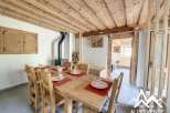 Discover the charm of this rustic dining area, perfect for family gatherings.