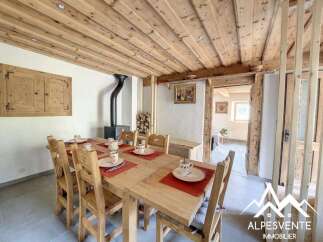 Discover the charm of this rustic dining area, perfect for family gatherings.