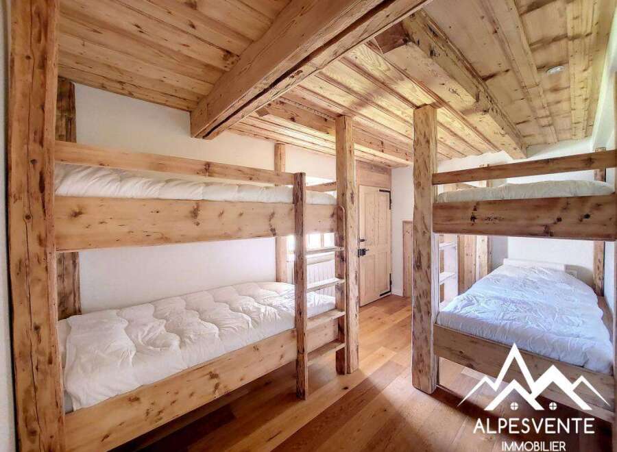 This charming property features rustic bunk beds, perfect for accommodating guests or family.