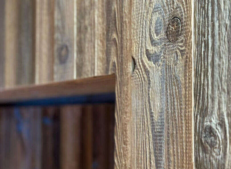 This property showcases exquisite craftsmanship with its stunning wooden paneling.