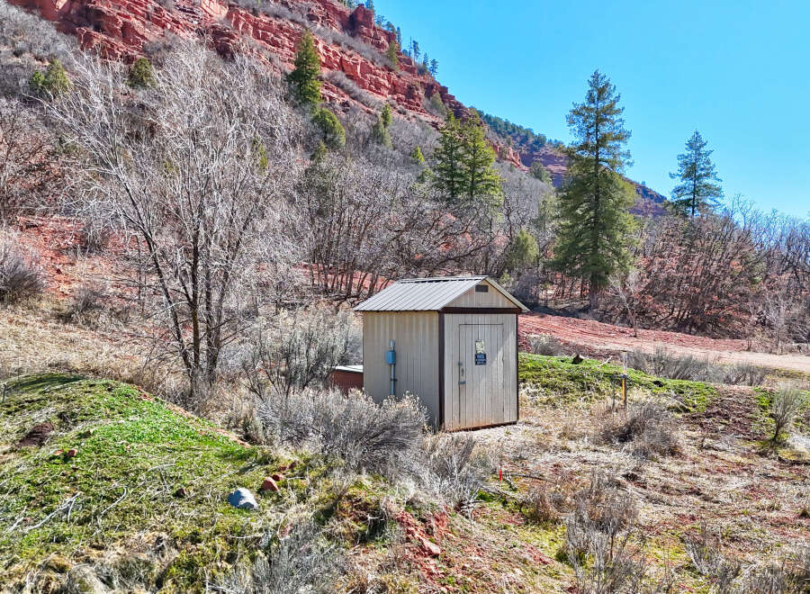 Nestled in a scenic landscape, this property offers a unique blend of natural beauty and functional amenities.