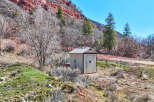 Nestled in a scenic landscape, this property offers a unique blend of natural beauty and functional amenities.