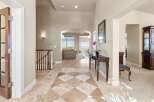 Step into luxury with this stunning entryway, showcasing a beautiful blend of elegance and comfort.