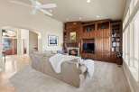 Step into luxury with this stunning property, featuring a cozy fireplace and a built-in entertainment center, perfect for relaxing evenings.