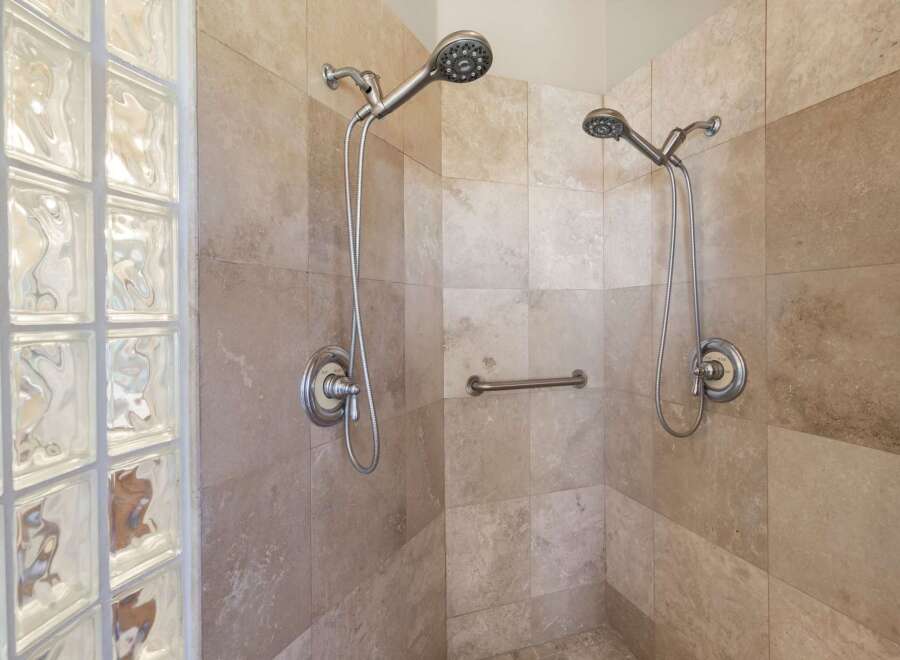 Step into a luxurious shower experience with this beautifully designed space.