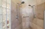 Step into a luxurious shower experience with this beautifully designed space.