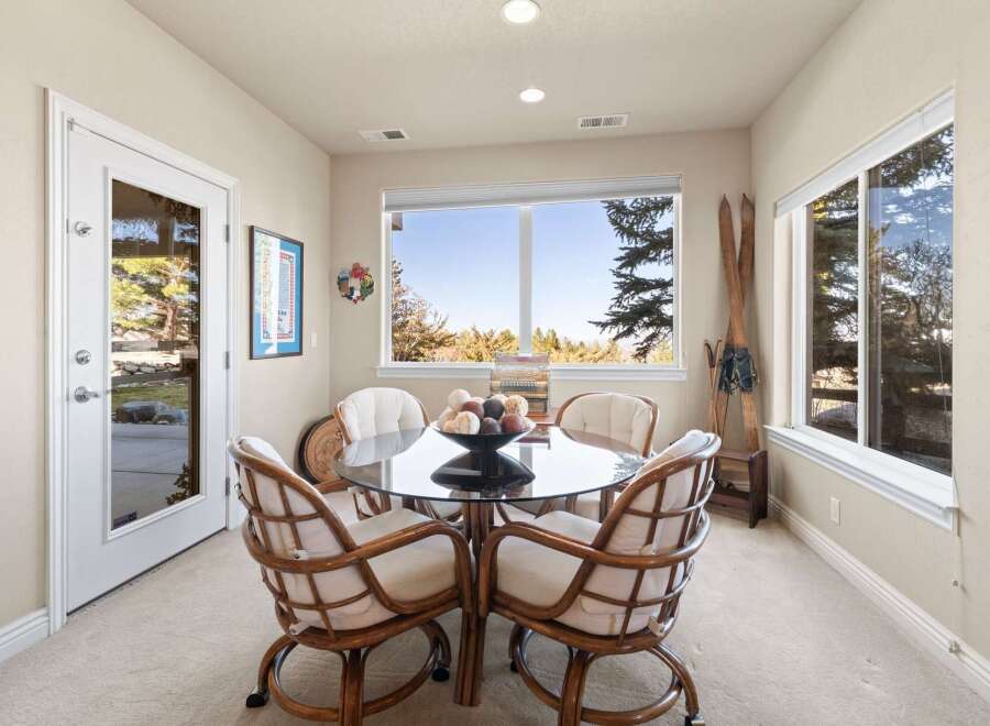 This dining area offers a bright and inviting space for meals and gatherings.