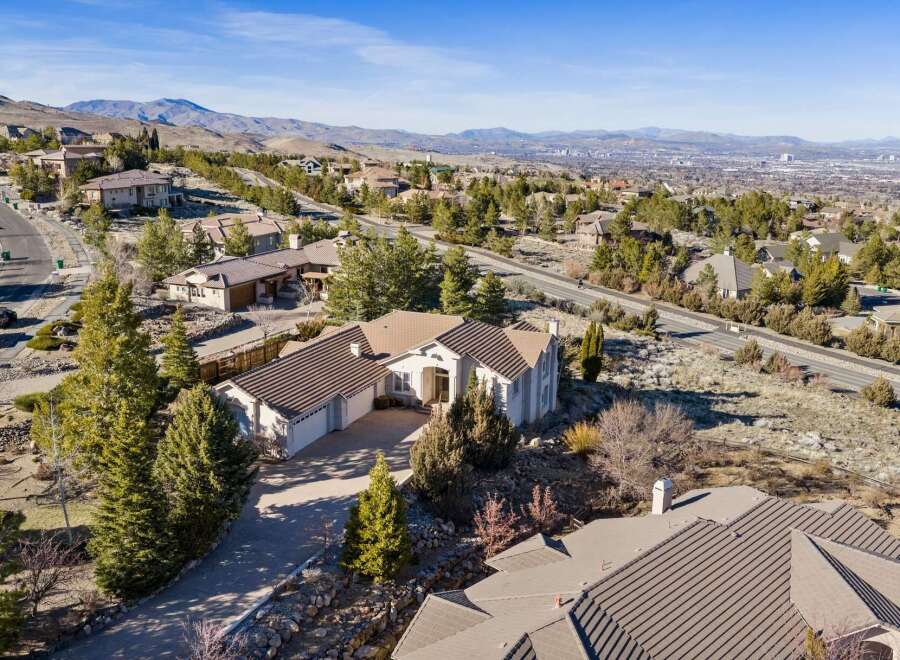 This stunning property boasts a prime location with breathtaking views of the surrounding mountains and city.