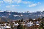 Nestled amidst the majestic snow-capped mountains, this charming property offers breathtaking panoramic views.