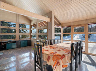 This stunning property boasts a bright and airy dining area, perfect for entertaining or enjoying family meals.