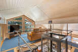 Discover the charm of this stunning property, featuring a spacious living area with a unique architectural design.