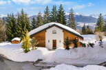 Discover the charm of this stunning chalet nestled in a picturesque winter wonderland.