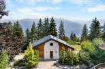 Nestled amidst the majestic Alps, this charming chalet offers a serene mountain retreat.