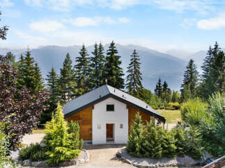 Nestled amidst the majestic Alps, this charming chalet offers a serene mountain retreat.