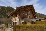 This stunning wooden chalet offers a perfect blend of rustic charm and modern comfort.