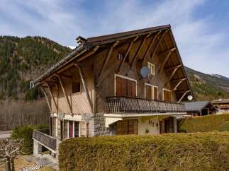 This stunning wooden chalet offers a perfect blend of rustic charm and modern comfort.
