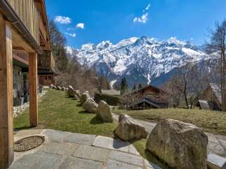 Discover the charm of this stunning mountain chalet, perfectly nestled amidst breathtaking alpine scenery.