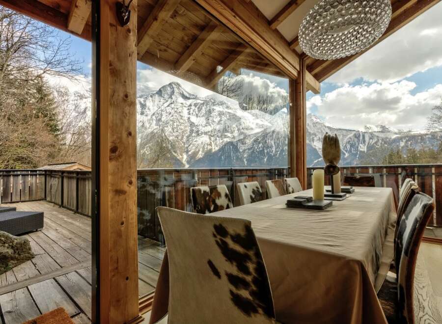 Experience breathtaking mountain views from this luxurious dining room.
