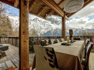 Experience breathtaking mountain views from this luxurious dining room.