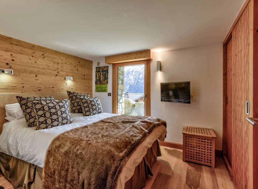 Experience luxury and comfort in this stunning bedroom.