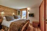 Experience luxury and comfort in this stunning bedroom.