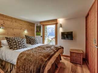 Experience luxury and comfort in this stunning bedroom.