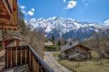 Experience the ultimate mountain retreat in this stunning chalet, boasting breathtaking views of the snow-capped peaks.