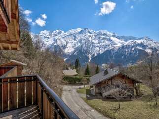 Experience the ultimate mountain retreat in this stunning chalet, boasting breathtaking views of the snow-capped peaks.