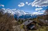 Nestled amidst the majestic snow-capped mountains, this charming chalet offers breathtaking views and a serene escape.