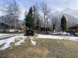 Nestled in a picturesque mountain setting, this property offers a serene escape.