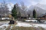 Discover a charming property nestled in a picturesque mountain setting.