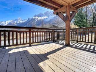 Enjoy breathtaking mountain views from this charming property.