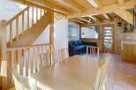 This charming property boasts a warm and inviting interior with exposed wooden beams and a cozy atmosphere.