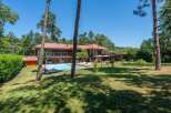 Discover luxury living in this stunning property featuring a private pool and expansive outdoor space.