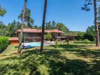 Discover luxury living in this stunning property featuring a private pool and expansive outdoor space.