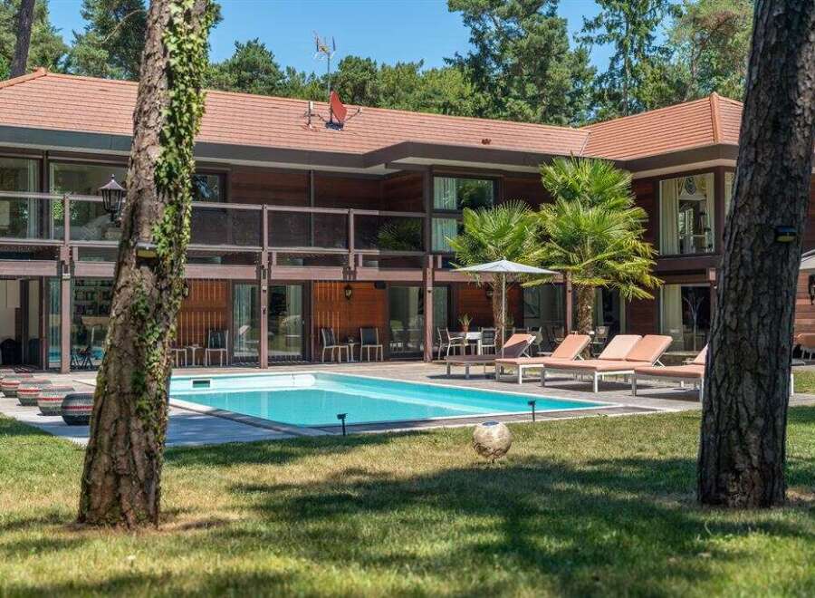 Discover luxury living in this stunning property featuring a private pool and expansive outdoor space.