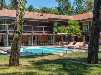 Discover luxury living in this stunning property featuring a private pool and expansive outdoor space.