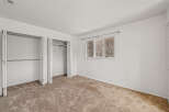 Discover the charm of this inviting bedroom, featuring a spacious closet and ample storage.