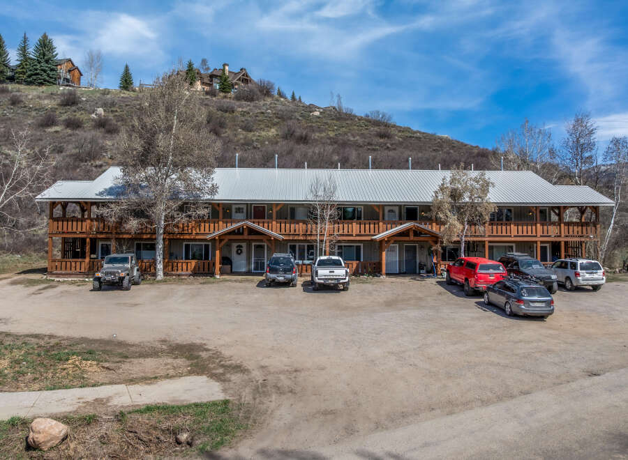 Discover a charming multi-unit property nestled in a picturesque setting.