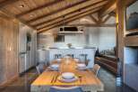 Experience luxury living in this stunning property, featuring a beautifully designed dining area.
