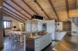 This stunning kitchen boasts a unique blend of rustic charm and modern design.