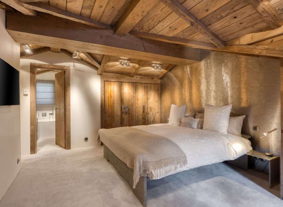 Experience rustic elegance in this stunning bedroom.