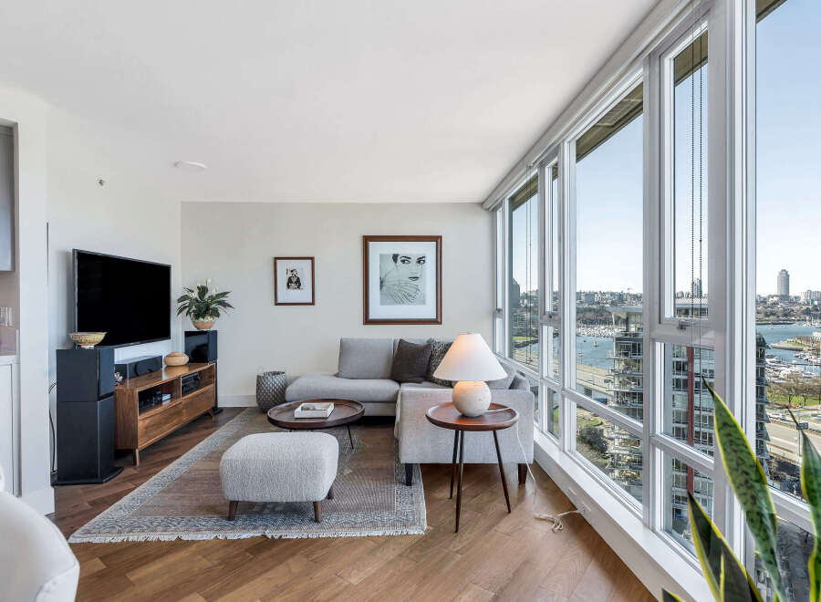 Experience luxury living in this stunning condo with breathtaking city and water views.