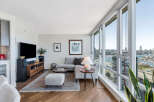 Experience luxury living in this stunning condo with breathtaking city and water views.