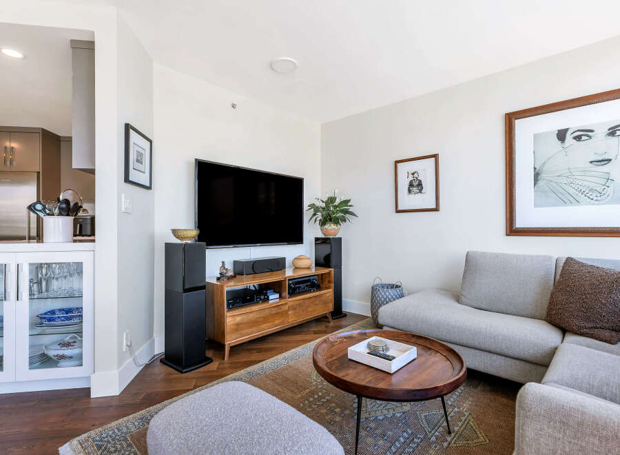 Step into modern elegance with this stunning living space.
