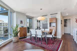 Experience luxury living in this stunning dining area, featuring a modern design with a touch of elegance.
