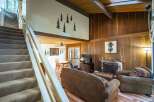 Step into this inviting home featuring a cozy living room with a fireplace, perfect for relaxing evenings.
